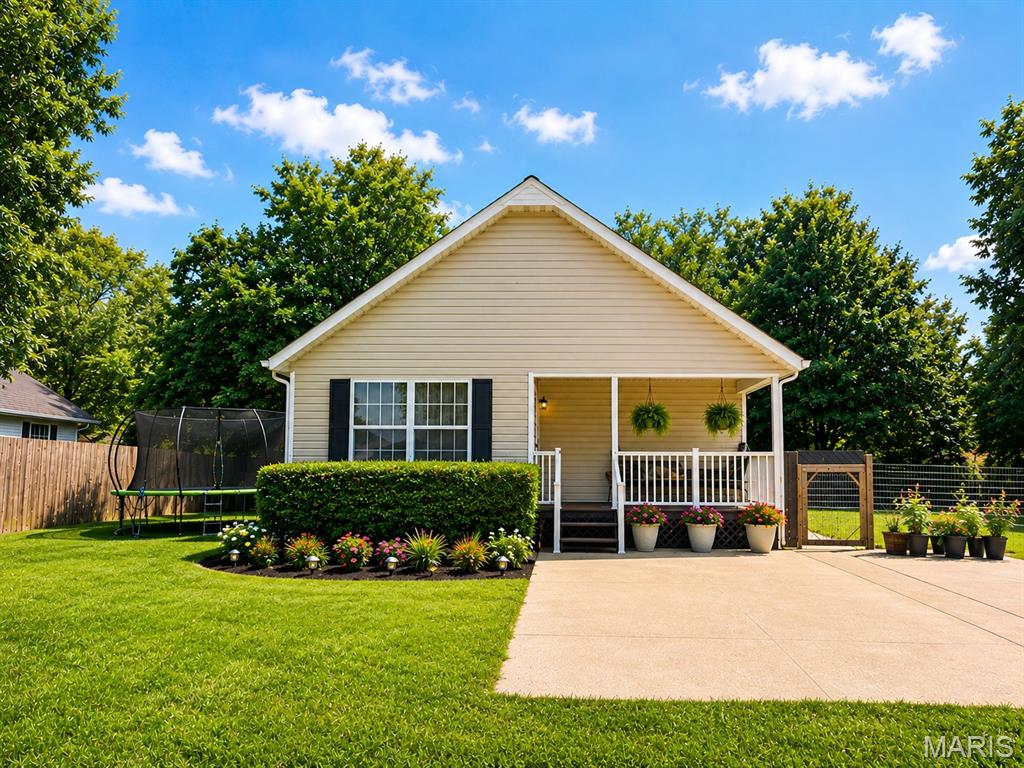 Welcome home to this charming 3-bedroom, 2-bath home, offering a wonderful combination of comfort, space, and convenience! Situated on a desirable corner lot, this home features a **fully fenced backyard** with plenty of room for entertaining, pets, play, or simply relaxing outdoors. The spacious 4-car driveway provides plenty of off-street parking, while the inviting front porch is the perfect spot to enjoy your morning coffee or unwind at the end of the day. Inside, you’ll find a comfortable and functional layout with plenty of potential to make the space your own. With great indoor and outdoor living space, this home has so much to offer—schedule your private showing today and come see why this could be the perfect place to call home!
