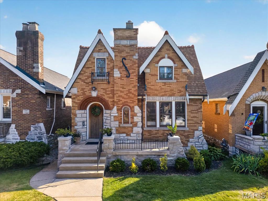 All the Southampton character and charm your heart desires—with all the space and privacy your sanity requires!

Welcome to this beautifully updated brick-and-stone 1.5-story home in the highly sought-after Southampton neighborhood. Situated on a quiet one-way street, this home is ideally located between Francis Park,  Hampton Avenue,  and just minutes from the charming shops, restaurants, and cafes of the Mackland District.

Offering four bedrooms and three beautifully updated full bathrooms, the home features a flexible floor plan designed for comfortable living. The main level includes two spacious bedrooms and a full bathroom, while the upper level offers two additional bedrooms ( one with a cedar closet), another full bathroom, and a bonus loft space with hookups for a stackable washer and dryer. A third updated full bathroom on the lower level provides even more convenience and versatility.

The sparkling, spacious kitchen is sure to please any cooking enthusiast with stainless steel appliances, quartz countertops, and stylish finishes. Thoughtful updates throughout enhance the home’s comfort and functionality while preserving the timeless character buyers love about Southampton.

Outside, enjoy a fenced backyard and patio—perfect for entertaining, pets, or simply relaxing outdoors. A garage and additional parking pad provide the off-street parking everyone wants in the city. Even better, a new roof was installed in 2026!

Move right in and enjoy an exceptional South City gem located close to neighborhood restaurants, coffee shops, parks, shopping, and everything this vibrant community has to offer. Updated, maintained, and loved and ready for you!