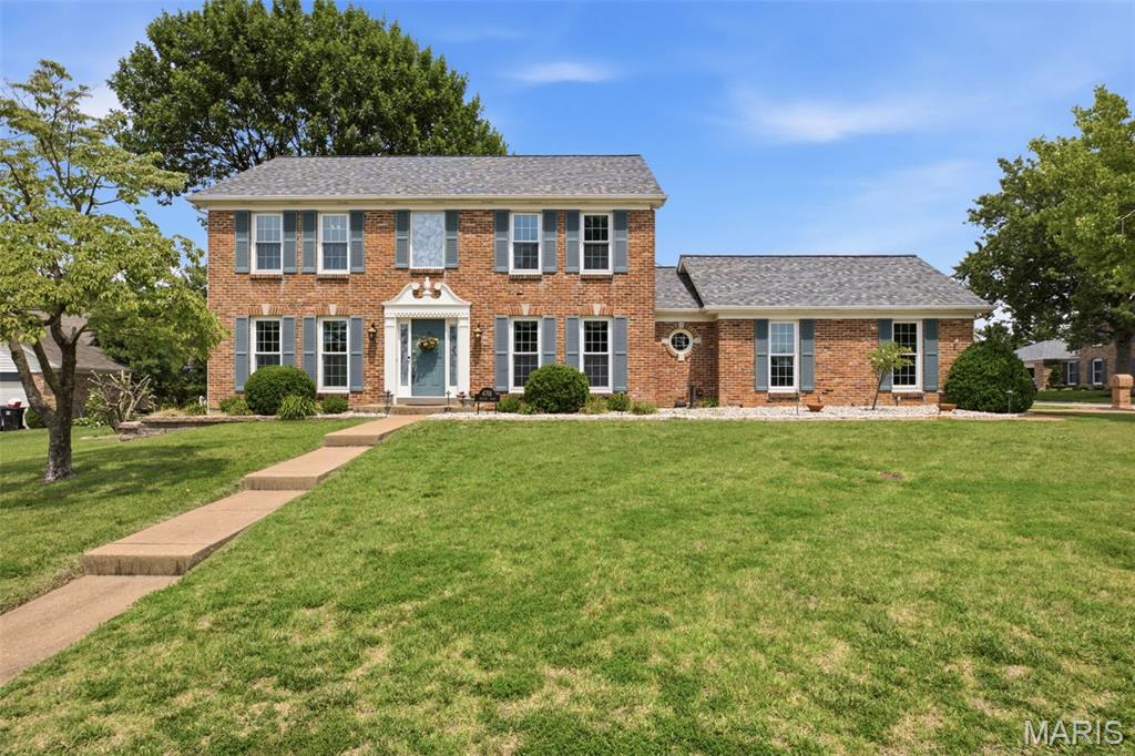 Brick home on a quiet cul-de-sac in St. Louis, Missouri 63129. Meticulously maintained by the same family for over 25 years, this property offers space, storage, and updates throughout for its next owner. The kitchen features high-end custom cabinetry, granite countertops, and stainless steel appliances, with a view overlooking the backyard — the kind of layout that makes cooking and entertaining feel effortless. The spacious living room is filled with natural light from floor-to-ceiling windows and centers on a gas fireplace, creating a warm gathering point for everyday life. Upstairs, the primary suite includes a walk-in closet with a custom closet system and a spa-style en suite bathroom, complete with a private retreat feel after a long day. Three additional bedrooms and an updated hall bathroom complete the second floor, offering a quiet, separated space for family or guests.
The finished basement is built for entertaining: a full basement bar anchors the space, alongside a dedicated pool table area and a separate entertainment area with room for a big-screen movie setup. Whether it's game day, a family gathering, or a quiet night in, this lower level gives the home a second living space that works as hard as the people in it. A side-entry two-car garage provides additional storage and convenient access to the home.
Located in the 63129 ZIP code of South St. Louis, this cul-de-sac setting offers the kind of quiet street where daily life simply works — minimal through traffic, friendly neighbors, and easy access to local shopping, dining, and parks throughout South County. Homes on streets like Idecker Place don't come up often, especially ones cared for by a single family for over two decades.