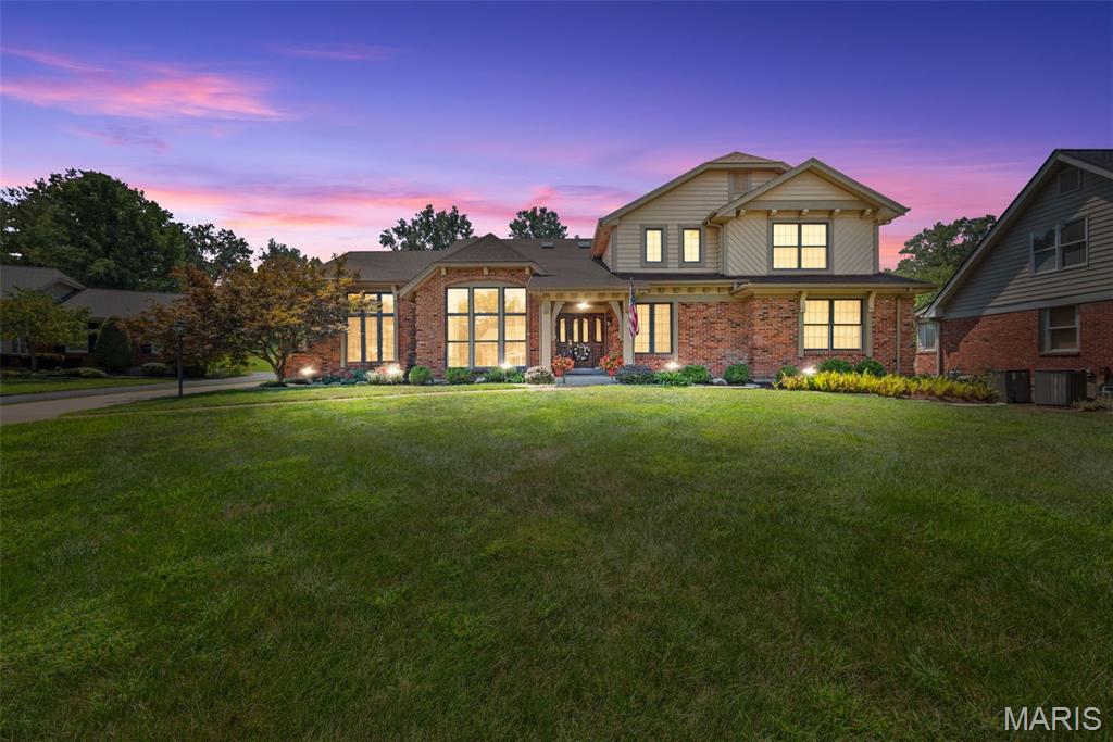 Welcome to this stunning Sunset Hills 1.5-story home, situated on a quiet cul-de-sac in the highly sought-after Lindbergh Schools. Sitting on a .46 acre lot, this home offers rare combination of privacy, space, & convenience while backing to Thomas Jefferson School’s soccer field. With 3,981 sq ft above ground, 4 beds, & 3.5 baths, the thoughtfully designed floor plan is ideal for both everyday living & entertaining. Step into the impressive 2-story foyer w/ sweeping staircase & vaulted great room featuring a striking floor-to-ceiling stone fireplace, Palladian windows, & French doors that frame picturesque views of the park-like yard. The layout includes 2 primary suites—one on each level! The main floor primary suite offers an expansive bath awaiting your final touches, while the upstairs suite provides flexibility for multi-generational living or guest accommodations. The formal dining room & separate living room showcase beautiful stained woodwork & custom moldings. The renovated kitchen is fully equipped w/ Cambria counters, white custom cabinetry, tile backsplash, & stainless appliances. Add'l features: main floor laundry, multiple walk-in closets, & an expansive LL offering endless possibilities for recreation or storage. Recent updates: Roof (2023) & dual HVAC systems (2020). Outside, the home’s curb appeal shines w/ 2-car garage, an extended driveway for extra parking, & a backyard that feels like your own private retreat. Welcome home!