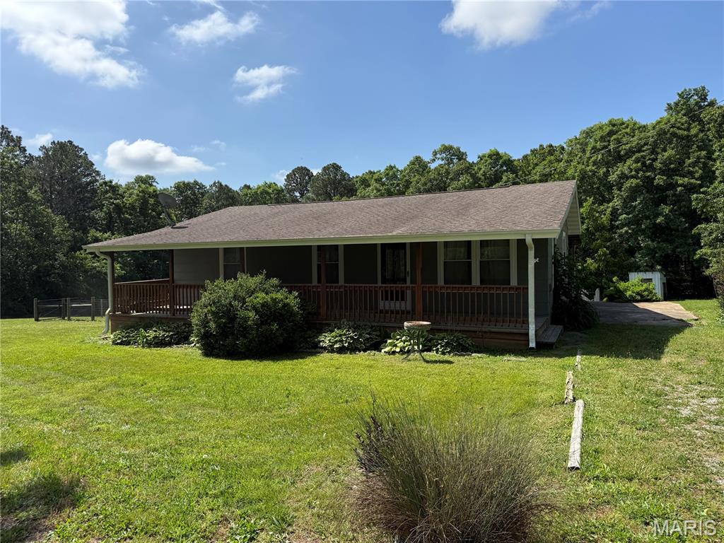 Welcome to your own slice of country paradise! This charming 3-bedroom, 1-bath home sits on 1.1 beautifully maintained acres and offers the perfect blend of rustic charm and modern updates. From the inviting covered front porch to the relaxing covered back deck, this property is designed for enjoying peaceful country living at its finest.
Inside, you’ll love the updated kitchen featuring refreshed cabinetry, along with a remodeled bathroom full of character and style. Major improvements have already been completed for peace of mind, including the HVAC system, windows, and septic system — all approximately 3 years old.
The home is full of warmth, personality, and timeless country elegance, creating a cozy yet refined atmosphere that truly feels like home. Conveniently located just minutes from the Big Piney River and Boiling Springs access, this property is ideal for outdoor lovers, weekend adventurers, or anyone seeking quiet country living with modern comfort.
If you’ve been searching for a property with charm and a relaxing rural setting, this one is a must-see!