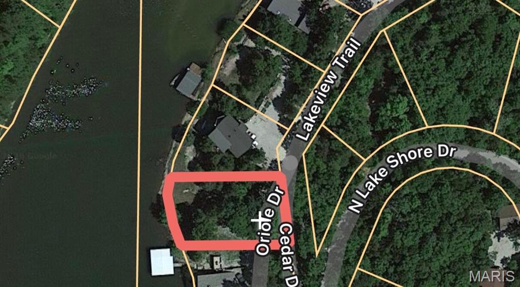 A beautiful waterfront lot perfect for building your dream lake retreat. Scattered trees add natural charm while still leaving ample open space for construction, outdoor living, and parking. With no utilities currently on site, you have a blank canvas to customize every detail of your future home.