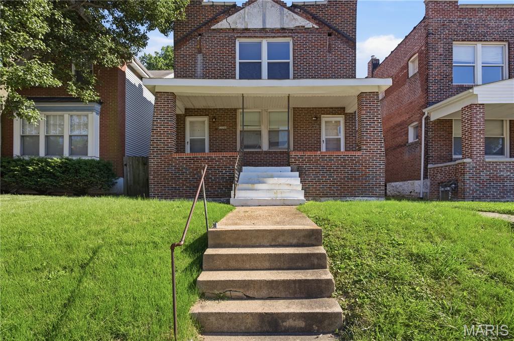 Highly desirable Tower Grove East neighborhood! This all brick two family duplex features spacious 3 bedroom, 1 bath units with original hardwood floors, high ceilings, and rear den/sunroom areas that add valuable living space. Major improvements include a brand-new roof, updated plumbing, New Hot Water Tanks, fresh paint, tuckpointing, and newer HVAC system. Both units are currently occupied, providing immediate income.  Located in one of St. Louis' most sought-after rental markets, this property offers strong upside potential and long-term wealth-building opportunities. Whether you're expanding your portfolio or seeking a house-hacking opportunity, these rare duplex delivers both cash flow and future appreciation. Showings available with an accepted contract only.