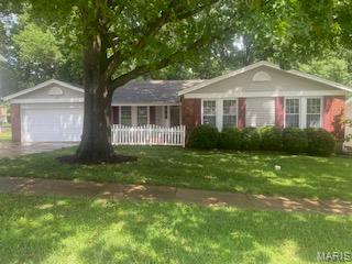 Updated ranch on a private, wooded lot! This spacious home offers an open and inviting floor plan with a fully finished walkout lower level featuring a full bath, large recreation room, custom marble-tile bar, and two versatile bonus rooms. Recent improvements include hardwood flooring, updated bathrooms, new bedroom carpeting, and a deck perfect for outdoor entertaining. The primary suite features a separate tub and shower, while maintenance-free vinyl siding and insulated thermal windows provide added value and efficiency. A rare combination of privacy, updates, and functional living space.  This home is a must-see!  Make your appointments today!