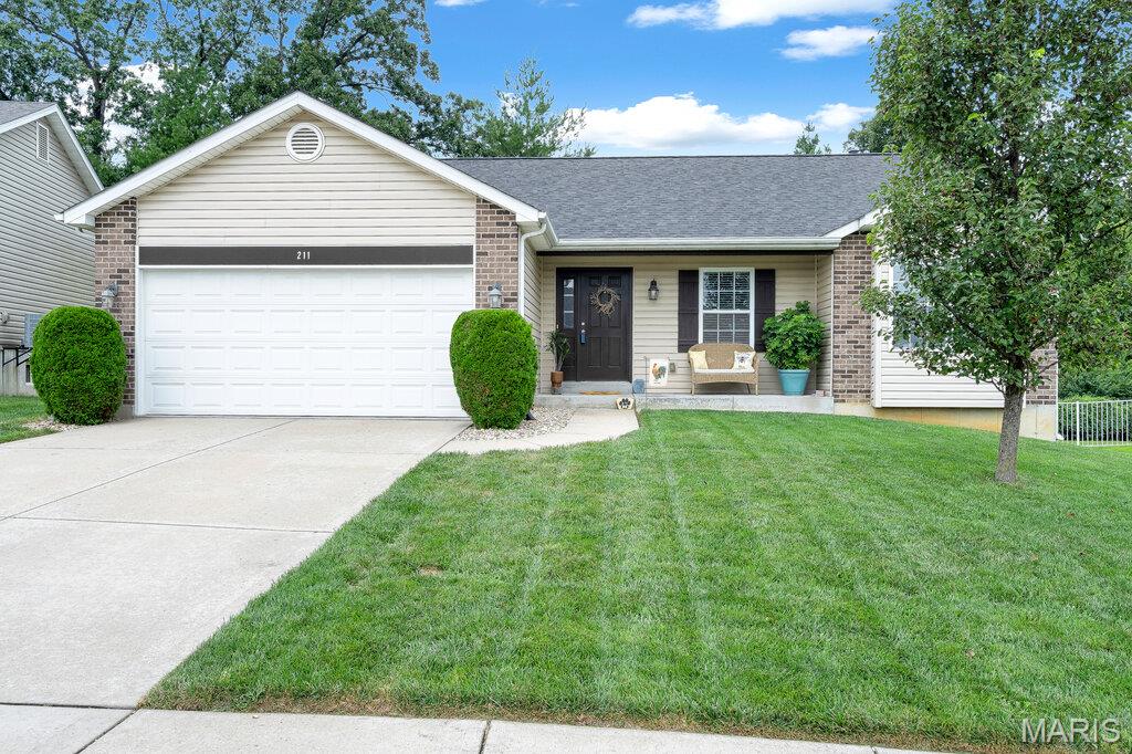 Wonderful location close to all things Wentzville! With 4 beds and 3 full baths, private back yard and over 2,500 total sq feet, this one is IT. Move-in ready with engineered hardwoods, ceramic tile, vaults, main floor laundry and incredible back yard patio/privacy and a firepit area! Walk in closets and super luxurious primary bath suite too! Roof is only 2 years old! Basement is finished with full bath, bedroom and entertaining/bar area that has to be seen to be believed!