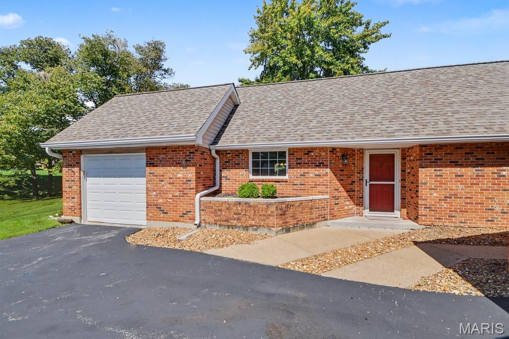 Unique opportunity in sought-after Hickory Sound! This beautifully updated 2-bedroom, 2-bath end-unit villa offers easy one-level living with no stairs and rare open floor plan. Open concept floor plan features bright living and dining areas with soaring cathedral ceiling, while the end-unit setting provides extra windows, abundant natural light, and added privacy. The updated kitchen with center island features newer cabinetry, quartz countertops, and stainless appliances.  Both bathrooms have been updated as well.  An attached 1-car garage adds everyday convenience, while the private patio offers outdoor space without the maintenance of a yard. HOA covers exterior maintenance for truly low-maintenance living. Convenient Ballwin location near Kehrs Mill, Manchester Road, highways, shopping, dining, and all that West County has to offer. Fully updated rare open floor plan, move-in ready, and rarely available — don't miss this Hickory Sound gem--will not last long!