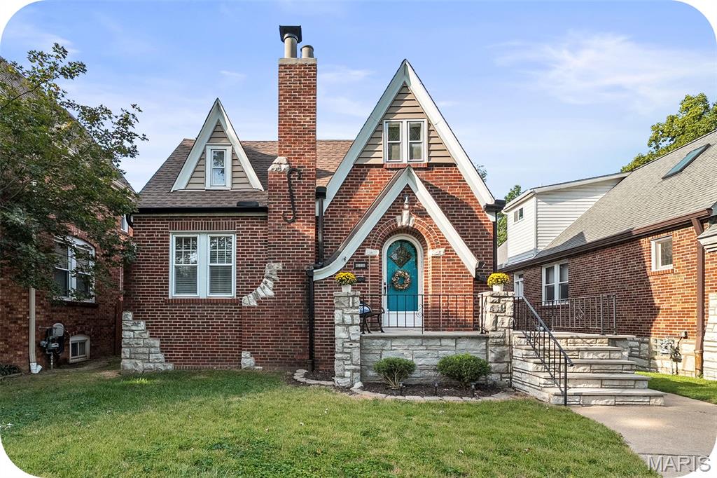 Single-owner charm meets timeless character in this enchanting “gingerbread” brick home in Holly Hills. Rich with original details, whimsical stonework, and beautifully preserved vintage character, this special home offers a rare glimpse into the craftsmanship of a bygone era. The inviting 4-bedroom, 2-bath home features a cozy and functional main-level floor plan with original plaster walls, hardwood floors, and a distinctive arched front doorway. Vintage finishes add even more personality, including period-specific details, retro Vitrolite tile, historic hardware, and original light fixtures. The thoughtful layout offers two bedrooms and one full bath on the main level, with two additional bedrooms and a second full bath upstairs—providing flexibility for guests, a home office, or additional living space. Recent updates include a brand-new roof, gutters, and siding accents, offering peace of mind while preserving the home’s historic appeal. Outside, enjoy a large, level lot and an extra-large garage with plenty of room for parking, storage, hobbies, or workshop space. A truly distinctive Holly Hills home where original character, thoughtful updates, and everyday livability come together.