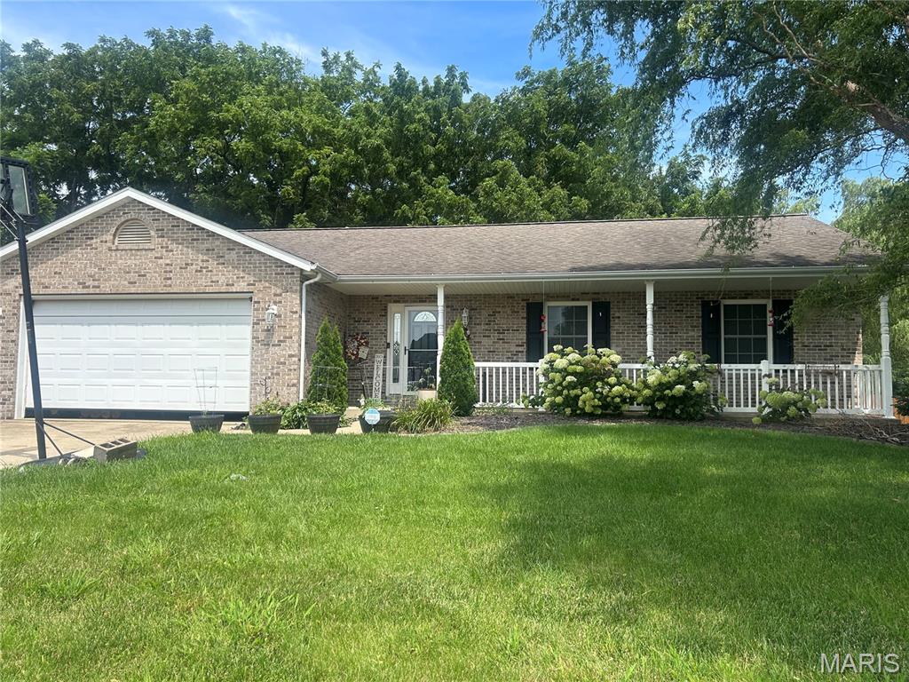 Professional pics to be added 7/1. Welcome home to this beautifully maintained 4-bedroom, 2.5-bath home nestled on a quiet dead-end street in the highly sought-after Highland School District! Offering a modern open-concept layout and an abundance of finished living space, this home is designed for both everyday comfort and entertaining.The bright, spacious kitchen features white cabinetry and flows seamlessly into the main living and dining areas, where the living room showcases a wood-burning brick fireplace. The main floor also offers a convenient laundry room, a custom built-in bench with storage in the entryway, two secondary bedrooms, a full bath, and a generous primary suite complete with a walk-in closet and private en-suite featuring dual sinks.The fully finished basement expands your living space with a fourth bedroom featuring an egress window, a non-conforming bedroom perfect for an office, hobby room, or workout space, a large family room, versatile rec/flex area, and a half bath. You’ll also appreciate the finished storage space, currently utilized for animals, offering endless possibilities to fit your needs.Step outside to enjoy the partially privacy-fenced backyard that backs to a wooded area, providing peaceful views and no rear neighbors. Additional highlights include an attached two-car garage, attractive brick front exterior, 200-amp electrical service, brand-new roof, brand-new sump pump with battery backup, and plenty of storage throughout.If you’re looking for space, privacy, and a move-in-ready home in a prime location, this one checks all the boxes! Audio/video surveillance doorbell camera. Sale is contingent upon closing of sellers' new home that they are already under contract on. Thank you