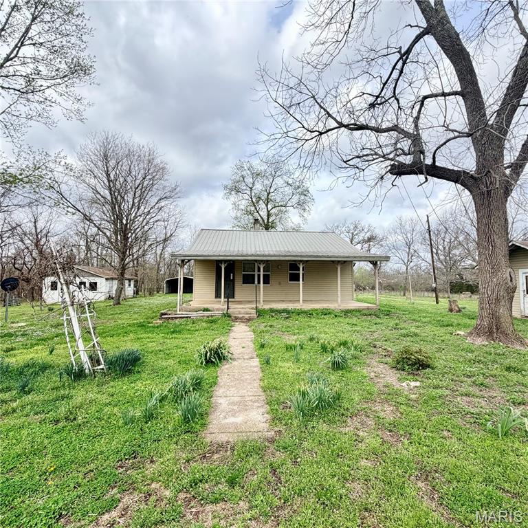 Tucked away where the world slows down, this 2-bedroom, 1-bath cabin sits on approximately 17 acres m/l of peaceful, private countryside. Surrounded by open skies and the sounds of nature, this property offers the kind of quiet you just can’t find in town. The land is ready for your vision—featuring a barn, established pasture, and fenced and cross-fenced acreage ideal for livestock, hobby farming, or simply enjoying wide-open space. Whether you’re looking for a weekend retreat, a hunting getaway, or a place to put down roots and live a simpler life, this property delivers. A true slice of heaven—remote, serene, and full of possibility.