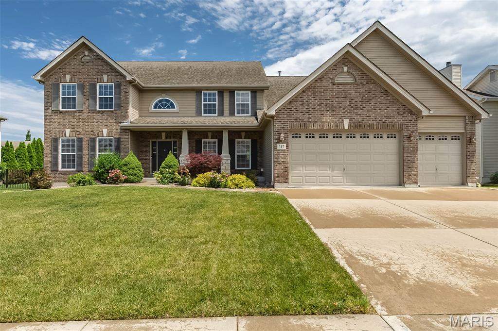 Welcome to 317 Trailhead Way in the sought-after Barathaven subdivision! This impressive 4-bedroom, 3.5-bath home with over 4,000 square feet of living space offers the perfect combination of space, functionality, and style. The popular 1.5-story floor plan features a large open layout, a stunning 2-story living room filled with natural light, and a cozy gas fireplace that anchors the main living space.

The main level also includes a private office, ideal for working from home, and a formal dining room perfect for hosting holidays and special gatherings. The heart of the home is the massive kitchen, complete with abundant cabinetry, extensive counter space, and plenty of room for family and friends to gather. Just off the kitchen you will find a large main floor laundry room

Upstairs, you'll find 3 spacious bedrooms, a large media room/playroom, and 2 full bathrooms, including a convenient Jack-and-Jill bathroom. The layout provides the perfect balance of privacy and functionality for family and guests alike. The property features an irrigation system in the front and back of the home.

The lookout basement is ready for your finishing touches, offering endless possibilities for additional living space and future value. Step outside to enjoy the new composite deck, fenced backyard, and a unique batting cage, creating the perfect outdoor space for entertaining and recreation.

With over 4,000 square feet, a main-floor office, formal dining room, gas fireplace, 4 bedrooms, 3.5 bathrooms, and exceptional indoor and outdoor living spaces, this move-in ready Barathaven home delivers the space, flexibility, and lifestyle today's buyers are searching for. Book your showing now, open for showings starting June 25th.