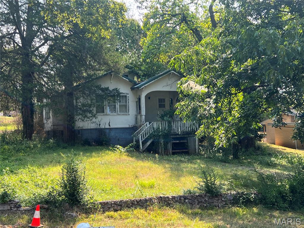 Brimming with Character and possibilities, this charming 1934 bungalow is ready to be brought back to life.  Featuring three bedrooms and one bathroom, this home offers incredible potential for the right buyer to restore, reimagine, and transform it into a true showstopper.