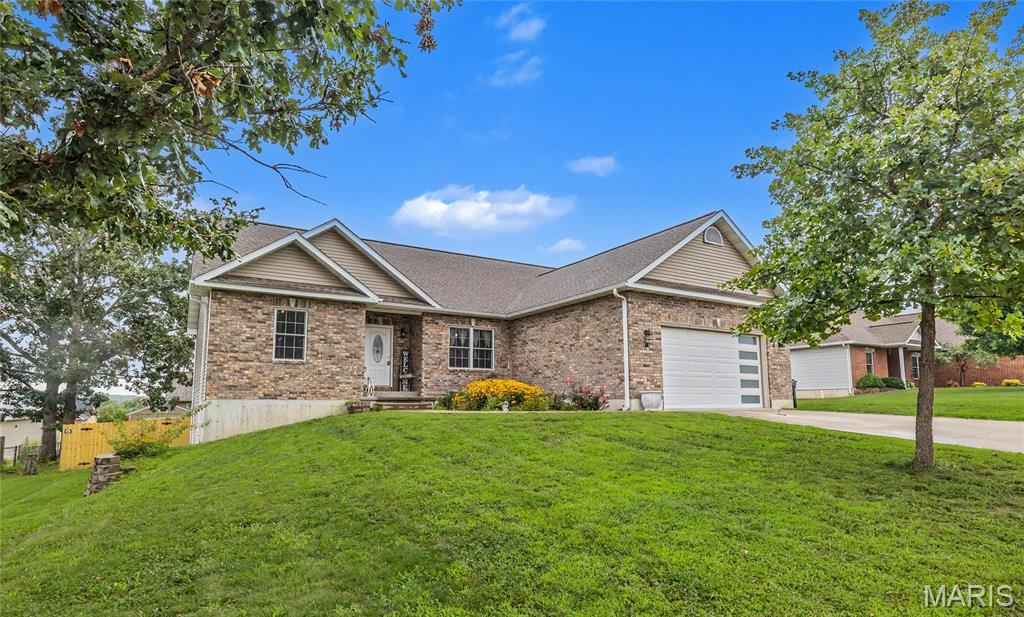 Welcome to this beautifully maintained 4-bedroom, 3-bath home in the highly sought-after Wild Horse Run Subdivision! From the moment you step inside, you’ll appreciate the spacious layout, featuring a welcoming living room and comfortable dining area perfect for everyday living and entertaining. The kitchen is sure to impress with nearly new stainless steel appliances, abundant cabinet space, and a cozy breakfast nook that makes mornings easy and inviting. The finished basement offers additional living space and convenient walkout access to the large deck, creating the perfect setup for summer gatherings, barbecues, and relaxing evenings outdoors. The backyard is enclosed by a privacy fence, providing a great space for kids, pets, gardening, or simply enjoying some peace and quiet. A handy garden shed offers additional storage for tools and outdoor equipment. With its desirable location, spacious floor plan, and great indoor and outdoor living spaces, this home is ready to welcome its next owners. Don’t miss your opportunity to make it yours—schedule your private showing today!