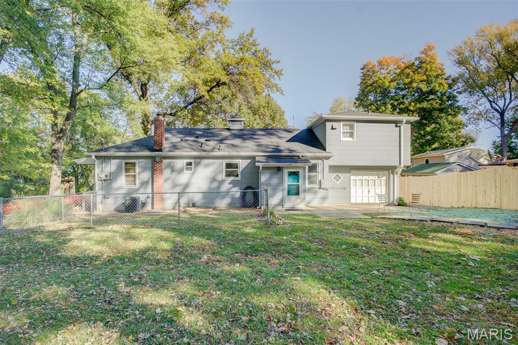 Tucked away on a private, tree-backed lot, this beautifully updated 3-bedroom, 2-bath home blends classic charm with modern upgrades. The main level features 2 bedrooms, 1 full bath, and a completely renovated kitchen with new flooring, cabinetry, backsplash, solid-surface countertops, under-cabinet lighting, stainless appliances, and an undermount sink and almost all new windows. The full bathroom has been completely updated with new vanity and tiled shower. The flooring throughout the main level is all brand new as well. Enjoy cozy evenings by the wood-burning fireplace or make use of the spacious laundry room—perfect as a butler’s pantry, mudroom, or additional storage space. The home retains its original character with built-in dining, cabinetry and charming storage nooks. The second story offers its own private entrance, a full kitchen, bedroom, full bath, and beautiful original hardwood flooring—ideal for a guest suite, rental unit, or Airbnb opportunity. Outside, you’ll find nearly an acre of peaceful space backing to trees, a new asphalt driveway, new roof, and an attached one-car garage that could easily be converted into additional living space. Located in Affton, you’re just 15–20 minutes from shopping, dining, and everything St. Louis has to offer.