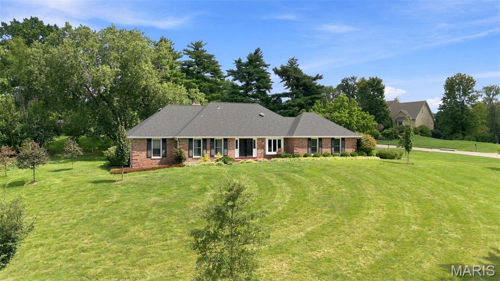 Bright and stylish, this meticulous 4 bedrm, 3 bath home is perfectly situated on a 1.1 acre lot in the popular Runnymeade neighborhood.  A high ceiling accentuates the entry foyer flanked by the formal living rm and dining rm.  The ‘heart’ of the home is the open kitchen featuring 2 islands, stainless appliances and French doors leading to the private patio and lush backyard.  The family room with fireplace completes this updated light filled space perfect for entertaining or a cozy night in.  The main floor primary suite offers plenty of closet space and updated neutral bath.  The second main floor bedrm (currently being used as an office) is steps from the updated hall full bath.  A laundry/mudrm completes the main floor.  Upstairs, find room to spread out with 2 large bedrms, updated bath and tons of closet space.  Lower level offers more storage space.  Notable updates include: roof (2021), windows (2022), furnace (2023) and AC (2023).  Large lower level and 2 car oversized garage.  Conveniently located to shopping, restaurants and hospitals.  Bellerive Elementary.