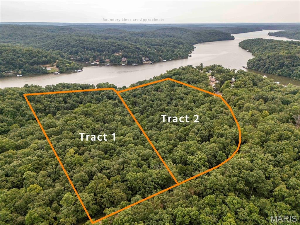 AUCTION LISTING - List price is not indicative of Seller’s final reserve amount.  This property is part of an online bidding event.  This sale will be executed with a no-contingency contract provided by brokerage representing the Seller. See MLS Supplement Document for complete details. 

Here is your opportunity to bid on two tracts totaling 21.7 surveyed acres in a peaceful and private setting on the west side of the Lake of the Ozarks. Located along Hiawatha Road near the 67-mile marker, these tracts offer the ideal combination of privacy, recreation, potential building sites, and convenient access to the lake.

If you have been looking for a manageable-sized lake property where you can build a home or weekend cabin while still having plenty of room to enjoy the outdoors, these tracts deserve a close look. The property features mature timber, diverse Ozark topography, abundant county road frontage, and multiple potential building sites. Several locations offer the potential for lake views while allowing you to position a home or cabin to maximize privacy and preserve acreage for recreation.

The timbered acreage provides outstanding recreational opportunities, with abundant deer sign and multiple areas suitable for hunting stand locations. Whether you enjoy deer hunting, hiking, exploring, or simply escaping the noise and activity of everyday life, this property offers the peace and serenity that make the Lake of the Ozarks so desirable.

Convenience is another major advantage. Boat ramps and marinas are only minutes away, giving you quick access to all that the Lake of the Ozarks has to offer. The Wigwam Public Boat Ramp is approximately 8 miles away, while a marina is just a short walk from the property. With Co-Mo Electric and Co-Mo high-speed internet available, county road frontage, and multiple build sites, these tracts provide an excellent opportunity to create your own private lake retreat.

Properties offering this combination of acreage, privacy, recreation, build-site potential, and proximity to the lake do not come available often. Whether you're looking for a permanent residence, weekend getaway, hunting property, or future investment, these tracts give you the flexibility to make the property your own.

Don't miss this opportunity to own your own piece of the Lake of the Ozarks. Properties with potential like this are becoming increasingly difficult to find.