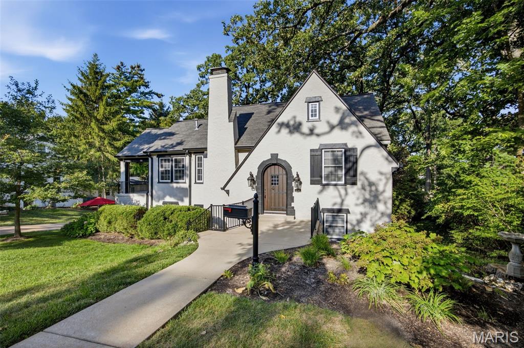 Architectural details of the past blend with amenities of the present in this Joy Built home.  Updated Kitchen featuring high end appliances.  Vaulted ceiling living room features ornate staircase to upper level bed & bath. Master bedroom suite w/luxury bath & double sinks. 1 bedroom is located on each of the three floors. Covered porch. Unique flexible floor plan. Kitchen with Quartz breakfast bar opens to family room w/French doors to 32x20 patio & park-like yard. Detached 2 car garage with extra workshop space.   Must see this great renovation with plenty of space for addition!