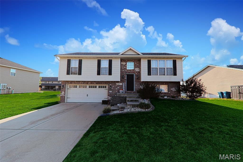Discover an attractive single family residence at 113 Olyvia DR, St Jacob IL. Meticulously constructed in 2011. This property, presented in great condition, offers a unique opportunity for sophisticated living. The kitchen is thoughtfully appointed with stainless steel appliances and features a practical peninsula, ideal for both meal preparation and casual dining. Elevated design defines the living room, which benefits from both a high ceiling and a vaulted ceiling, creating an expansive and airy atmosphere. Among the four well-proportioned bedrooms, one offers the convenience of an ensuite bathroom, providing a private retreat. The property also includes a dedicated laundry room, enhancing daily functionality. Outside, a private yard offers ample space for recreation, complemented by a dock for waterfront access, an inviting outdoor dining area, and a patio. A private pool adds an exclusive leisure element, while a built-in garage provides secure parking and additional storage. This property presents a refined living experience, inviting discerning buyers to schedule a private viewing.