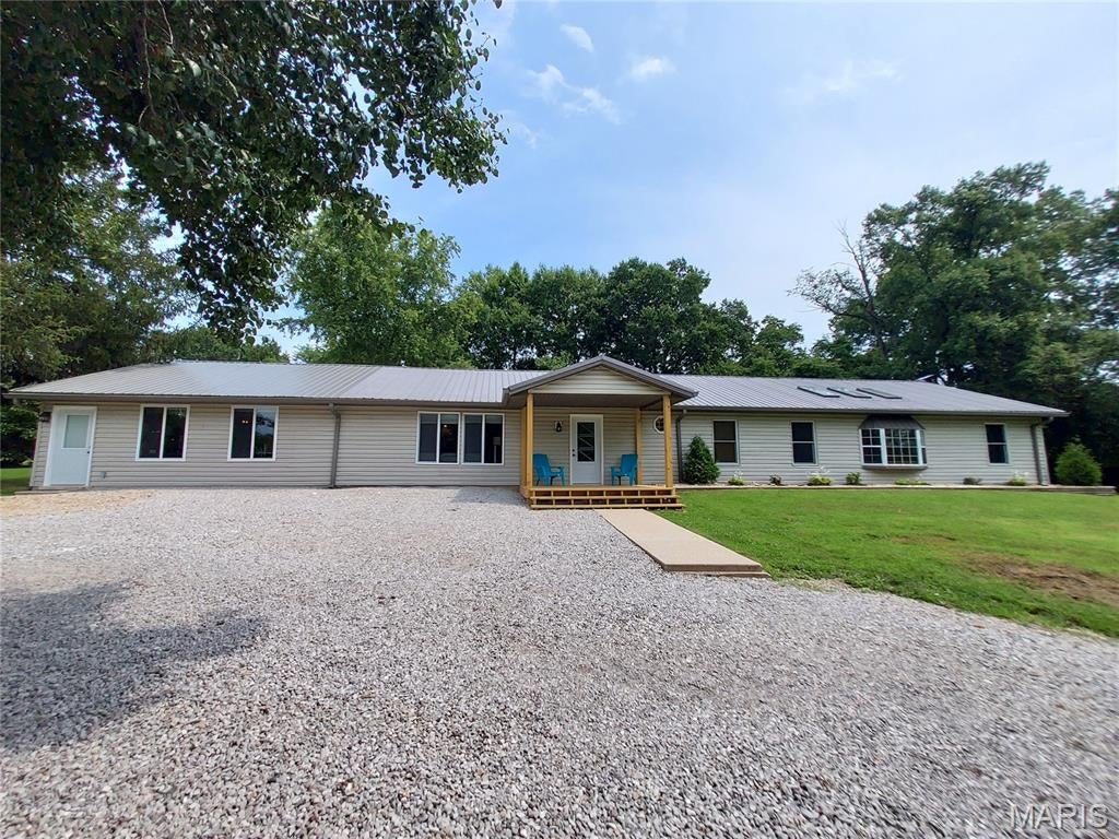 If you've always wanted to move out into the country on small acreage this is the place for you!  With a 30 x 40 two car garage/shed with it's own 200 amp service, a pond, and 6.5 fenced acres you can finally start that hobby farm you've always dreamed of or just enjoy the privacy of being secluded in the middle of your own little paradise. Sit out on the front porch and watch the deer or turkeys wander through the yard or grill out on the back patio overlooking your garden. 

There is plenty of room inside too! This 2800 sf foot home has 5 bedrooms and 3 bathrooms, but also offers two living areas in addition to a bonus area which can be used for a home business, office, movie room or guest suite! With it's own HVAC system and it's own water heater it can operate independently of the rest of the home. 

Lots of closets and a big pantry provide plenty of storage and the separate dining room and cozy living room fireplace make this a great place for entertaining friends and family. Send the kids to one end of the house and let the adults enjoy quite conversation at the other end! This home has had lots of updates in the last 15 years including, new furnace in 2017, new septic in 2018 (pumped again in 2026), and a new roof in 2012. 

Showings begin Saturday August 15th.