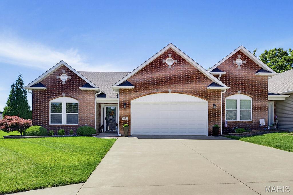Welcome to 3172 Park Place Drive, a beautifully maintained 3-bedroom, 2-bath home offering a practical open-concept layout designed for comfortable everyday living.  The bright living space offers a split bedroom floorplan, laundry room, spacious kitchen, dining area, and a large primary suite.  The kitchen is thoughtfully laid out with many cabinets, an abundance of counter space, a pantry, and a breakfast bar.  The dining area features beautiful windows and opens to the living room with a gas fireplace. Out back you can relax and enjoy a covered patio with a section of vinyl fencing for privacy.  The primary suite offers an oversized bathroom with separate shower and tub, double vanities, a walk-in closet, and plenty of storage.  If you want to fish or relax by the water, there is a community lake maintained by the HOA.  Call today and schedule a tour of your new home!