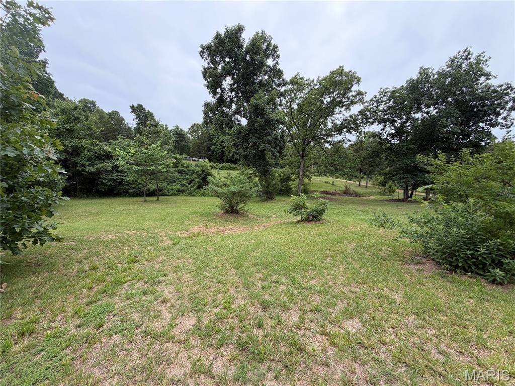 Discover the possibilities with this beautiful piece of vacant land offering road access and trails throughout the property. This acreage is perfect for outdoor enthusiast, hunting, recreation, building your dream home, camping or whatever you desire, featuring a great mix of wooded area open spaces property already has a deer stand, making it an excellent spot for wildlife lovers, and hunters alike. Whether you’re looking for privacy, adventure or investment potential, this property has so much to offer. Don’t miss your chance to own your own slice of the outdoors call today for more information. This property won’t last long. This 10.29 Acres is part of a larger tract and is already surveyed off in 4 parcels.