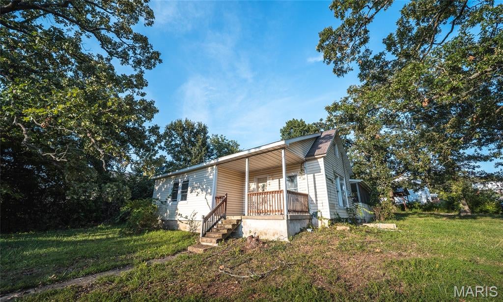 Welcome to a home full of potential, perfectly positioned on a desirable corner lot near campus! Whether you’re searching for a smart investment property, a rental opportunity, or a place to make your own, this 3-bedroom, 1-bath home offers a versatile layout and recent updates that make it easy to envision what comes next. Step inside to find new flooring and fresh paint throughout, creating a clean, refreshed feel from the moment you arrive. The inviting sunroom provides a bright and comfortable space for morning coffee, reading, or relaxing, while the functional floor plan offers plenty of room for everyday living. Outside, the fenced backyard provides added privacy and usable outdoor space. Enjoy grilling or entertaining on the back deck, or take advantage of the screened-in side yard for an additional spot to unwind while enjoying the outdoors. With its convenient location close to campus, this property has excellent potential for investors looking to add to their rental portfolio, as well as buyers searching for an affordable home in a convenient location. Don’t miss the opportunity to see the potential this property has to offer—schedule your private showing today!