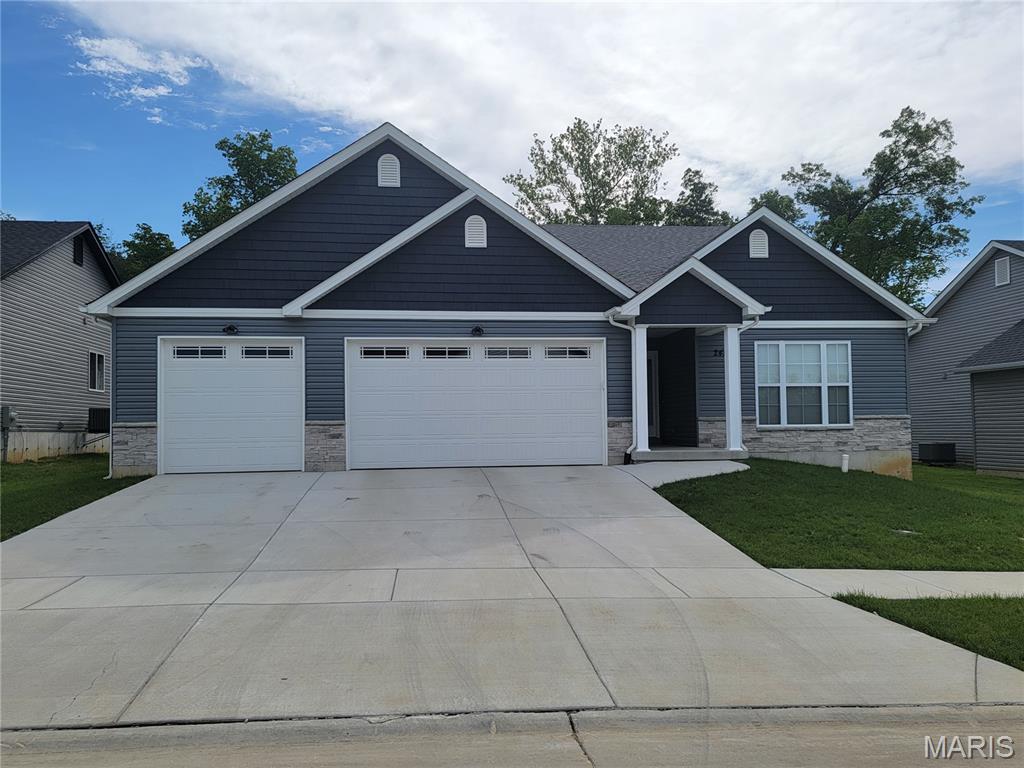 Built in June 2025 and originally purchased for $432,000, this exceptional ranch home offers a rare opportunity to own a nearly new, move-in-ready property in the highly sought-after Kensington Ridge subdivision at a price below market value. Designed for modern living, the open-concept floor plan features soaring vaulted ceilings, rich hardwood flooring, and a chef-inspired kitchen with stone countertops and an oversized island perfect for gathering and entertaining. The luxurious primary bath showcases double vanities and a spacious walk-in shower, creating a relaxing spa-like retreat. Additional highlights include a full basement, an attached 3-car garage with an 8-foot door, and a covered patio ideal for outdoor dining and entertaining. With its blend of quality craftsmanship, stylish finishes, and exceptional value, this home presents an outstanding opportunity for buyers seeking comfort, convenience, and modern elegance.