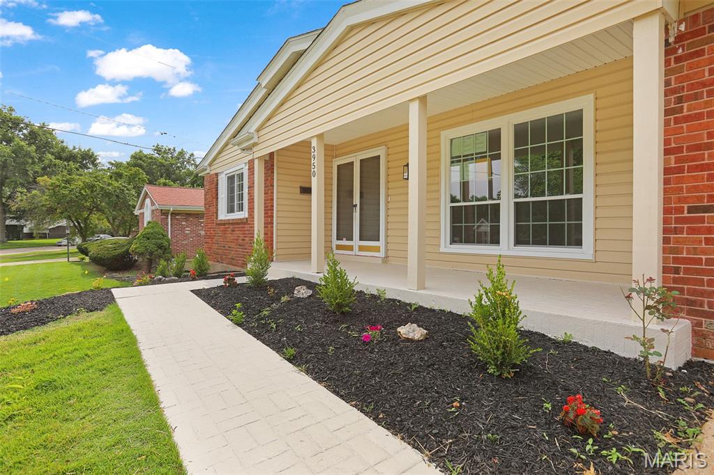 This beautifully renovated 3 bedroom, 2.5 bath ranch has been updated inside and out! The main level features all-new paint, flooring and lighting, along with custom doors and new baseboards throughout. The completely renovated kitchen features custom cabinetry, quartz countertops and stainless steel appliances. Both main-floor bathrooms have been fully renovated with custom tile surrounds, including a private ensuite primary bath with a sleek custom black shower base. Downstairs, approximately 800 square feet of finished space provides plenty of room to spread out, with a huge rec room, entertaining area with bar, and a fully renovated half bath. Outside, the home features a new roof, updated siding, new exterior lighting, fresh landscaping, and a new garage door opener. Major system updates include a new electrical panel and new air conditioner. With extensive renovations, stylish finishes and plenty of additional finished living and entertaining space downstairs, this home is truly move-in ready from top to bottom.