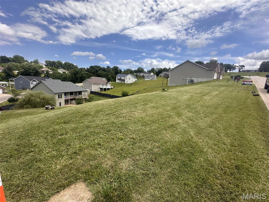 Build your dream home or your next investment property on these three adjoining lots being sold together for one price. Located on a quiet cul-de-sac in a beautiful established neighborhood, the property offers scenic views, city utilities on site, and sloping terrain well suited for a walk-out basement.  Zoned R1C, the property allows for a single-family home, duplex, or triplex, creating unique flexibility for homeowners and investors alike.  

Experience the charm of small-town living in New Haven while remaining just minutes from the conveniences of Washington and the attractions of Hermann. Affordable building sites with this much versatility are becoming increasingly difficult to find.  Contact us TODAY for more information!

Listing includes the following 3 parcel numbers totaling approximately .37 of an acre.
04-7-35.0-1-014-129.560
04-7-35.0-1-014-129.550
04-7-35.0-1-014-129.540