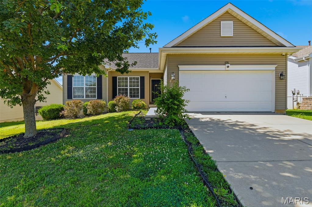 Welcome home to this beautifully maintained 3-bedroom, 2-bath ranch in the highly desirable Wentzville area! Featuring luxury vinyl plank flooring throughout the main living areas, this home offers an open-concept floor plan perfect for both everyday living and entertaining.

The spacious kitchen boasts stylish black cabinetry, a tiled backsplash, stainless steel appliances, and plenty of counter space, all flowing seamlessly into the dining and living areas. Convenient main floor laundry adds to the home's functionality and ease of living.

The primary suite offers a private retreat, while two additional bedrooms provide flexibility for family, guests, or a home office. Step outside onto the deck, accessible directly from the main floor, and enjoy views of the backyard. The walk-out basement offers endless possibilities for future finishing, storage, or additional living space.

Residents enjoy access to fantastic community amenities, including a neighborhood pool and park. Conveniently located near shopping, dining, schools, and major highways, this move-in-ready home combines comfort, style, and convenience.

Don't miss your opportunity to make this wonderful Wentzville home yours!