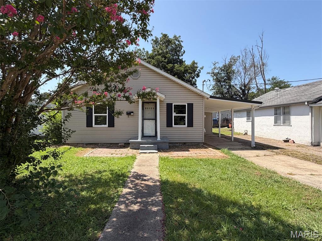 Welcome to this charming 2+ bedroom home conveniently located in the heart of town. This home offers a combination of character, functionality, and outdoor space, making it a great opportunity for its next owner.

The exterior features vinyl siding with decorative shutters, an attached one-car carport, and a deep approximately 150-foot backyard with two sections of chain-link fencing..

Inside, you’ll find partial hardwood flooring, an attractive archway doorway, and a living room with a decorative ceiling. The kitchen offers nice cabinetry, a pantry located just a few steps away, and an adjoining dining area. 

Conveniently located near the heart of town, this property offers plenty of potential and space both inside and out. Schedule your showing today!