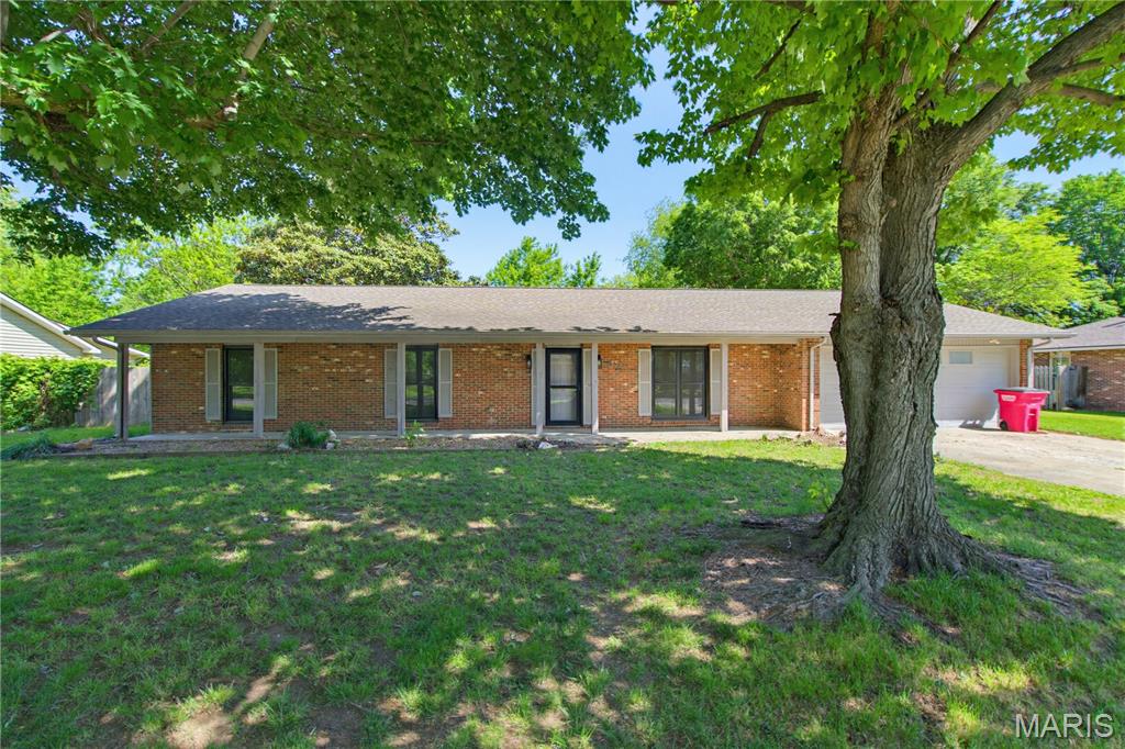 Recently remodeled and ready for Y-O-U!
This great home is updated and move in ready! Improvements include all new flooring, windows, fixtures, and hardware—just to name a few. Bathrooms are spacious and have been tastefully modernized with new vanities, tile, and matching fixtures. The eat-in kitchen boasts beautiful quartz countertops, subway tile backsplash, and updated appliances. From the garage workshop to the laundry cabinetry to the walk-in closets, storage abounds. You're sure to enjoy the large covered front porch, screened-in porch, paver patio, and large fenced-in yard. This home truly has it all!