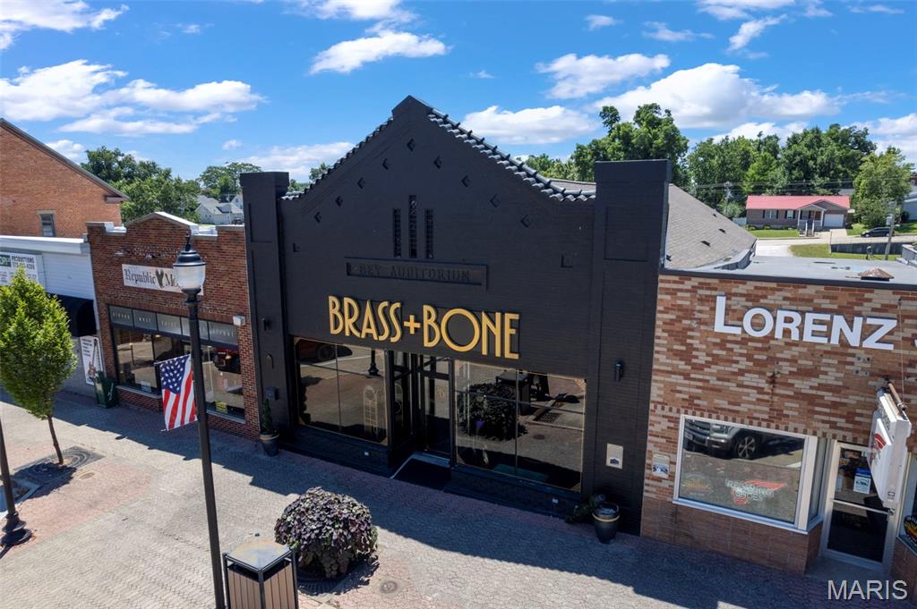 An exceptional opportunity to own one of downtown Perryville's most distinctive commercial properties. Ideally located on the historic square, this beautifully renovated event venue and bar blends timeless architectural character with sophisticated, modern design to create an unforgettable atmosphere.
Inside, the space is rich with personality, featuring dramatic black interiors, original tin ceilings, warm wood accents, elegant gold finishes, and thoughtfully curated décor that sets the stage for everything from private events and celebrations to upscale dining or nightlife. Every detail has been carefully considered to create an inviting, elevated experience for guests.

The property also includes a fully equipped industrial kitchen, walk-in freezer, and flexible spaces designed to support a variety of hospitality and event concepts. Downstairs, the expansive basement offers outstanding potential for future expansion, with architectural plans already completed for a renovation that would add even more usable space.

The real estate is available for purchase, with the existing business and furniture, fixtures, and equipment (FFE) also available separately, providing a rare turnkey opportunity for investors, restaurateurs, or entrepreneurs looking to establish a premier destination in one of Southeast Missouri's most charming downtown districts.

Whether you're continuing its current success or bringing a new vision to life, this is truly a one of a kind property with exceptional style, functionality, and room to grow.