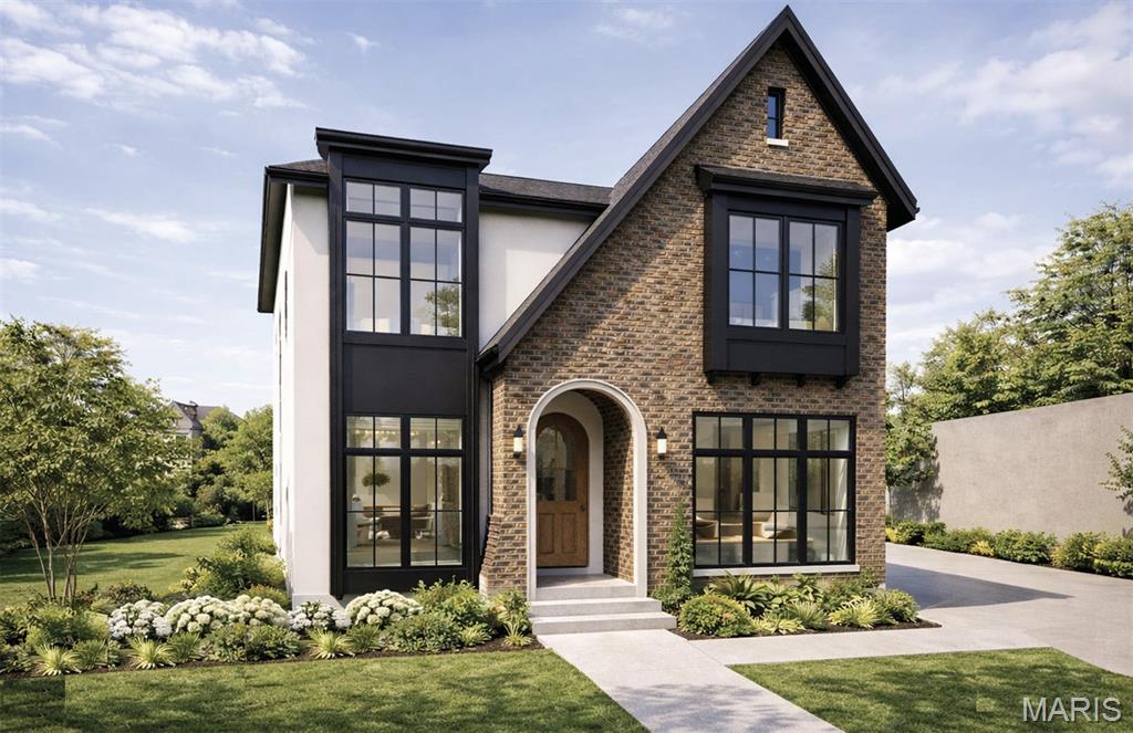 Welcome to this stunning new construction home offering 3,100 square feet of thoughtfully designed living space across two elegant stories, plus a beautifully finished basement. Designed for both everyday comfort and upscale entertaining, this residence combines luxury finishes with timeless functionality.

The main level features 10-foot ceilings that enhance the open, airy feel throughout. At the heart of the home is a chef-inspired kitchen equipped with luxury appliances, generous counter space, and seamless flow into the living and dining areas—perfect for gatherings of any size. The primary bedroom suite, provides a private retreat with a spa-like bathroom designed for relaxation.

Upstairs, three well-appointed secondary bedrooms offer ample space for family, guests, or home offices, all complemented by 9-foot ceilings that continue the home’s spacious feel.

The finished basement expands your living options with a wet bar and an additional bedroom and full bathroom—ideal for guests, extended family, or even a home gym.

Outdoor living is equally impressive. Enjoy outside entertaining on the covered rear patio with a cozy fireplace, overlooking a large backyard with plenty of room for play, gardening, or future customization. A detached two-car garage adds both convenience and architectural charm. An optional three-car is available for additional storage.

Work directly with the FM Design Build team and personally choose all interior finishes and customize the interior floor plan. 

This exceptional home blends modern luxury, flexible living spaces, and refined details—an ideal opportunity for those seeking a new home with comfort, style, and room to grow.