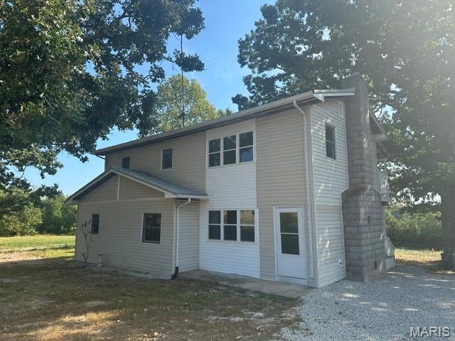 LOCATION LOCATION LOCATION!! Looking for a few acres just 15 minutes from Salem? Here it is! 5 bed 2 bath house sitting on 6 acres with a detached 2 car garage. Main level hosts a living room with a wood burning insert and patio door to back deck, kitchen with all new stainless appliances, dining area, two bedrooms, bath with walk-in shower and a huge laundry room with door leading outside.  Upper level hosts the primary bedroom with patio door to balcony, two additional bedrooms and a full bathroom.  40x30 detached garage with two overhead doors (one with opener), a walk door, concrete floor insulated ceiling and 110 and 220 electric.  Lots of new updates.  Just minutes away from Akers Ferry, Flat Nasty, Cedar Grove and Montauk State Park!