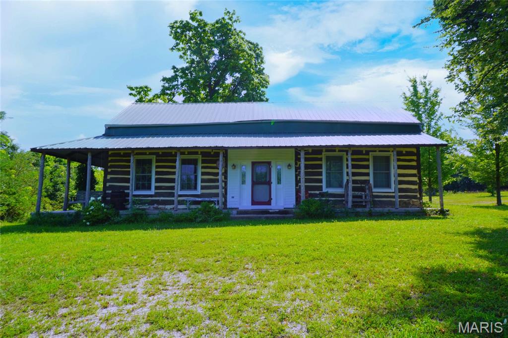 Historic 1852 Renovated Log Home on 118 Acres with a Beautiful 5 Acre Stocked Lake, Ridgetop Grass Field and Rolling Woods! Located in Southern Montgomery County near Rhineland this Property Offers Great Hunting and Fishing! The Log Home has been Totally Renovated Including Electric, Plumbing, Kitchen, Baths, HVAC and Roof! There are 4 Bedrooms, 2 Baths,, Large Equipped Kitchen, Center Entry Hallway, Big Front Porch and More! Bonus, Owner Will Divide as Follows:  4.5 Acres & Log Home - $400,000;  45 Acres with Log Home and 5 Acre Stocked Lake - $783,750;  53 Acres with Timber & 4 Acre Grass Field - $397,500;  20 Wooded Acres with Building Site - $150,000. Call for Additional Details! This is a Duplicate Listing of MLS# 25052546.