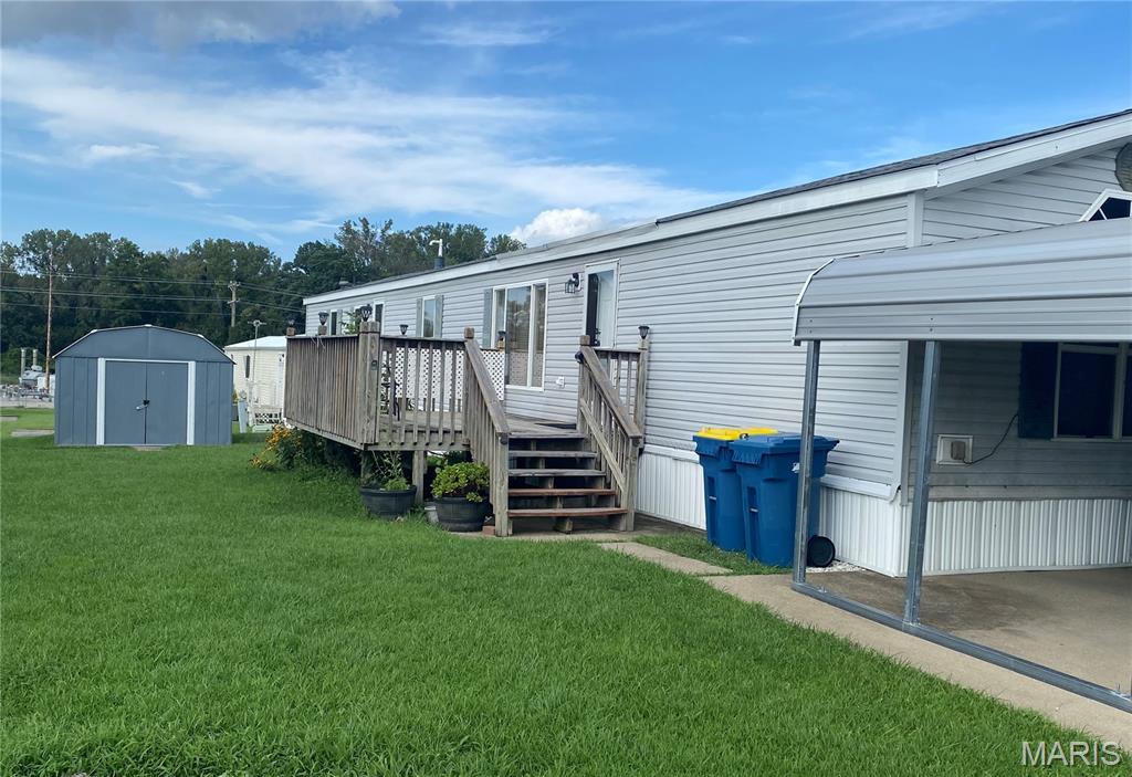 1995 Dutch mobile home located in Wheel Ranch Mobile Home Park. The spacious living room features a wood-burning fireplace, while the kitchen offers a gas stove, dishwasher, microwave, and refrigerator. The primary bedroom includes a walk-in closet, and the primary bath features a separate tub and shower. A convenient utility area is located off the kitchen and includes a washer and dryer that stay. A second bedroom and full bath complete the home. Enjoy the outdoor space with a deck, covered carport, and storage shed. Lot rent is $400 per month. Property is being sold AS IS, and seller will make no repairs. Buyer must apply for and be approved for membership with the mobile home park owner. All items currently in the home will remain with the property, and cleanup/removal of items will be the buyer's responsibility.