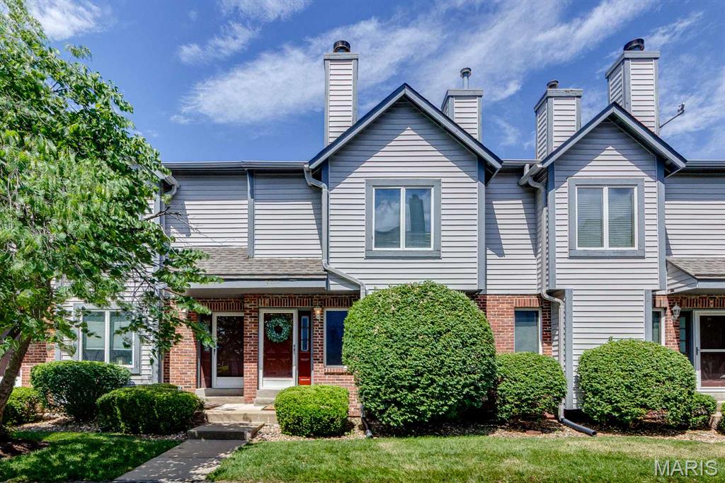 Beautifully maintained townhome in the heart of St. Charles offering the perfect blend of comfort, convenience, and low-maintenance living. The main level features an open floor plan with a cozy gas fireplace, laminate flooring, and large windows that fill the space with natural light. The fully equipped kitchen offers stainless appliances, and breakfast bar that opens seamlessly to the dining area. Sliding doors lead to a private deck overlooking common ground, an ideal setting for morning coffee or evening relaxation. Upstairs, you'll find two spacious bedroom suites, each featuring a private ensuite bath and large walk-in closets, providing excellent space and privacy. The lower level includes a convenient mudroom, laundry area, and access to the attached two-car garage. Residents enjoy community amenities including a pool and clubhouse, all while being just minutes from major highways, shopping, restaurants, and entertainment. Move-in ready and waiting for its next owner!