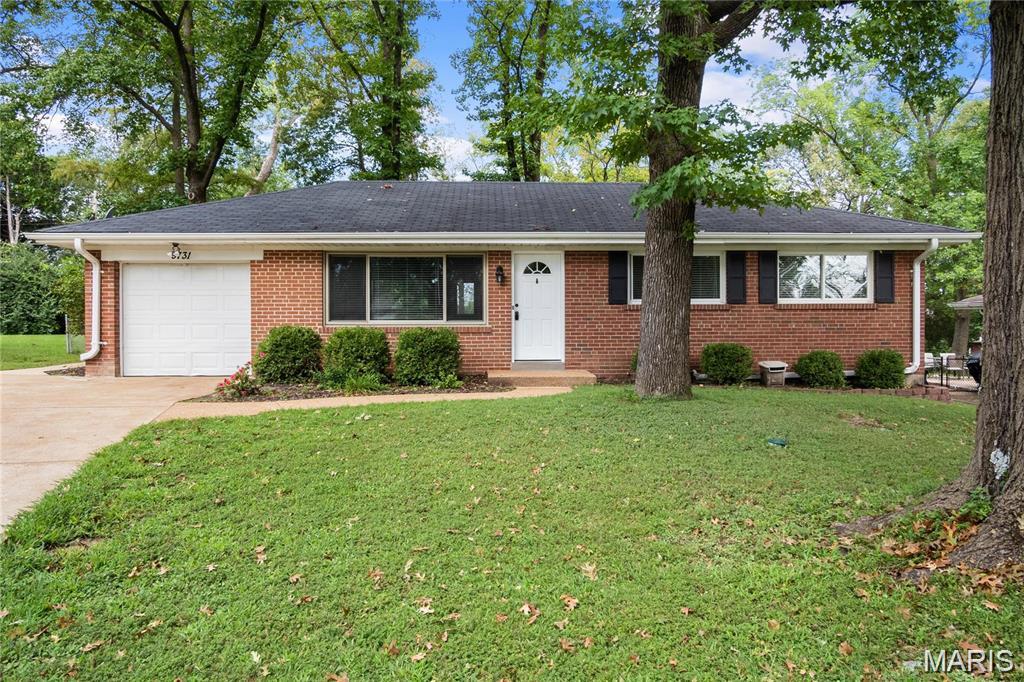WOW!!! Move right in and start enjoying this nicely updated brick ranch - too many updates to list! Great curb appeal, extensive landscaping, attached garage and oversized concrete driveway. Upon entering the house you notice the gleaming hardwood floors and the bright natural light from the all the thermal/tilt in windows. The updated kitchen features stainless steel appliances, maple cabinets and beautiful ceramic tile backsplash and flooring. Renovated bathroom boasts granite countertop, ceramic tile floors and shower surround. The professionally finished lower level offers an additional living space, which makes for the ideal 'man cave' or playroom. The fenced backyard is second to none. Your park like setting is private, level, shaded, quiet and comes with a large patio, making it perfect for your summer barbecues. All of this in the highly rated Lindbergh school district. Just minutes from Grants Trail, hwys & parks. Owner/broker