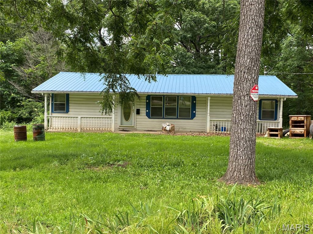 Looking for a property with potential? This 2-3 bedroom, 1-bath home sits on approximately 7 acres and offers a unique opportunity for investors, renovators, or buyers ready to create their own vision. While the home is in need of repair, the setting is what truly sets this property apart. A winding path leads from the home to an old barn and continues on to a peaceful pond, creating a picturesque backdrop with plenty of room to explore and enjoy the outdoors. Whether you're looking to restore, rebuild, or invest, this property offers the chance to add value while enjoying the privacy and beauty of acreage living. Bring your ideas and imagination—opportunities like this don't come along often.
