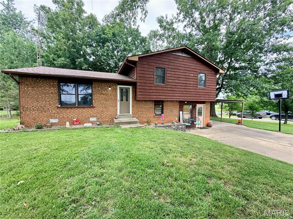 Country Living with a 24x44 Shop! Looking for space inside and out? This charming 3-bedroom, 1-bath home sits on just over a half-acre on the outskirts of town, offering the perfect blend of convenience and country living. With approximately 1,340 sq. ft. (+/-) of living space, this home features newer flooring and a newer roof, giving you peace of mind and modern appeal. Inside, you'll appreciate the built-in bookcases, custom cabinetry, and spacious bedrooms with ample closet space. Step outside to the back patio, an ideal spot to relax, entertain guests, or enjoy peaceful evenings overlooking your property. The standout feature is the impressive 24x44 shop with a concrete floor and 220-volt electric service—perfect for hobbies, storage, a workshop, or small business needs. Conveniently located just a few miles outside the city limits, this property offers room to spread out while remaining close to town amenities. Don't miss this opportunity to own a home with the space, updates, and shop you've been searching for!