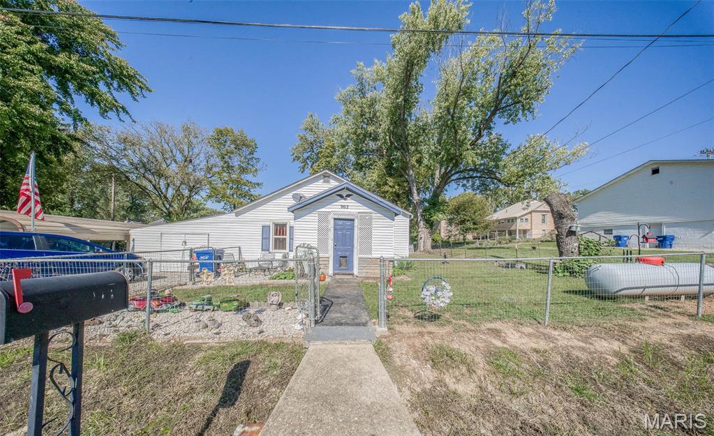 Charming 2-bedroom, 1.5-bath home on a large corner lot in the heart of Salem! This inviting property features a closed-in porch, new siding, new roof, and new windows for peace of mind. Inside, you’ll find new flooring throughout, a comfortable living room, a dedicated dining area, a cozy kitchen boasting white cabinetry & sleek stainless steel appliances, and a spacious laundry/utility room. The fenced front yard adds curb appeal and security, while the 2-car carport, storage/workshop area, and shed (included) provide plenty of space for hobbies and tools. Enjoy the nice yard—perfect for outdoor relaxation or gardening. Don't miss this opportunity!  Schedule your private showing soon!