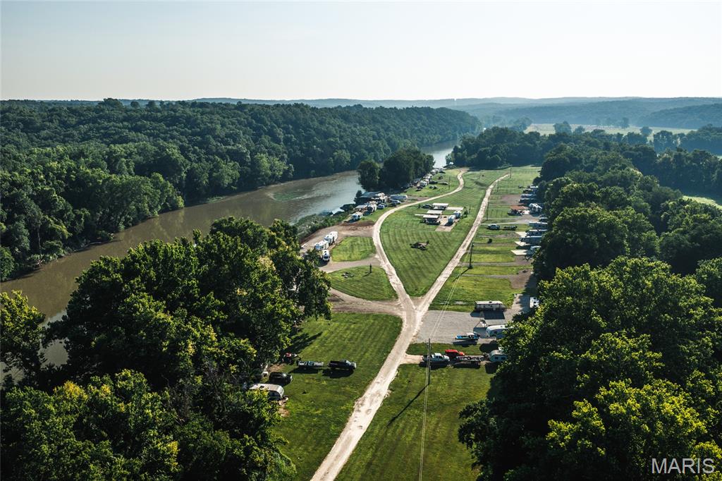 Discover the perfect escape near the scenic Gasconade River with this ready-to-enjoy river lot offering the ideal setup for outdoor
adventures, relaxing weekends, and unforgettable memories. Whether you’ve been dreaming of a peaceful camping retreat, a place to
park your RV, or a future recreational getaway, this property provides the perfect blend of convenience and nature. Located inside a
gated community, this property offers added privacy and peace of mind while still giving you easy access to everything the river lifestyle
has to offer. Owners also enjoy access to a private concrete community boat ramp, making it simple to launch your boat, kayak, or canoe
and spend the day exploring the beautiful Gasconade River. With water, sewer, and electric already in place, you can spend less time
preparing and more time enjoying your surroundings. Picture mornings with coffee by the campsite, afternoons spent fishing or floating
the river, and evenings gathered around a campfire under the stars with family and friends. The Gasconade River area is known for its
scenic beauty, outdoor recreation, and relaxed atmosphere, making this property an excellent choice for weekend getaways, seasonal
use, or future investment potential. Whether you’re seeking a quiet retreat or an adventure-filled escape, this property is ready for your
vision. River lots with utilities, gated access, and private boat ramp privileges are hard to find—schedule your private showing today and
start enjoying the river lifestyle you’ve been waiting for!