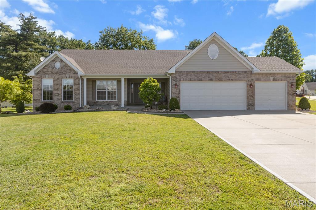 Spacious ranch on a large, half acre corner lot. Walk up to the covered porch, perfect for enjoying that morning coffee. Step inside to the open layout featuring the family room and formal dining room. The eat-in kitchen is assessable from both rooms.  The kitchen has a large island, walk-in pantry and plenty of cabinets.  Off the kitchen is a half bath and main floor laundry room.  The other side of the kitchen is attached to the 4 season room, perfect for extra space all year round. The primary bedroom has a custom walk-in closet. The ensuite has double sinks, a wonderful soaking tub, and a separate shower. The main floor is completed with a full bath, including a tub/shower combo, and 2 spacious bedrooms.  The partially finished lower level has an egress window, large rec-room, wet bar, full bath, and 2 rooms that could be a sleeping area and/or an office. There are 2 large storage areas.  One is currently being used as a craft room but would also be a great workshop. The large backyard has a patio with a pergola and so much room to play and hang out. The home finishes out with a 3 car garage and a 9 car driveway.  Bring on the get togethers.  Close to many restaurants, shopping, and highways 70, 270, 370, 94, 364, and 40. Make an appointment today before the sign says Sold.