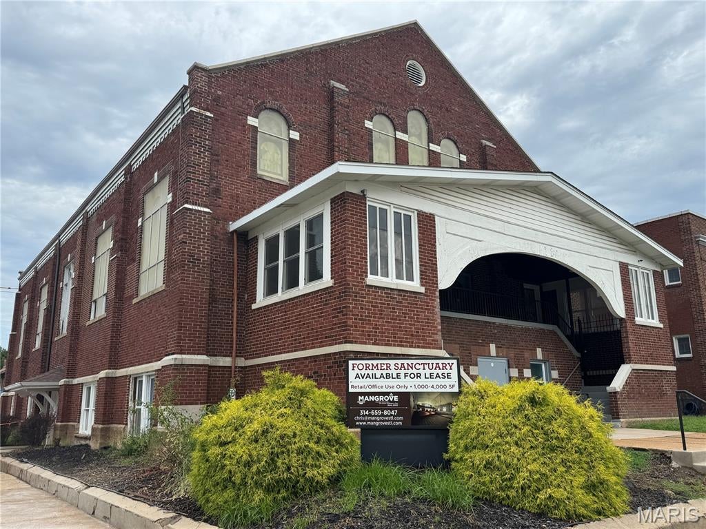 Beautiful sanctuary space with large stained-glass windows, tin ceiling, and glazed brick right at Tower Grove Avenue. Great street visibility and high traffic count. One large sanctuary space with an altar area, choir loft, three offices (or storage rooms) and a fourth office would be built out as a bathroom. Tenant improvement budget available for building a bathroom. Could be used as an office or retail space (any use that is "community gathering" would require a sprinkler to be installed). Near the exciting Grove Commercial District. Street parking. Professionally managed by Mangrove. Mangrove offices and woodshop in the basement