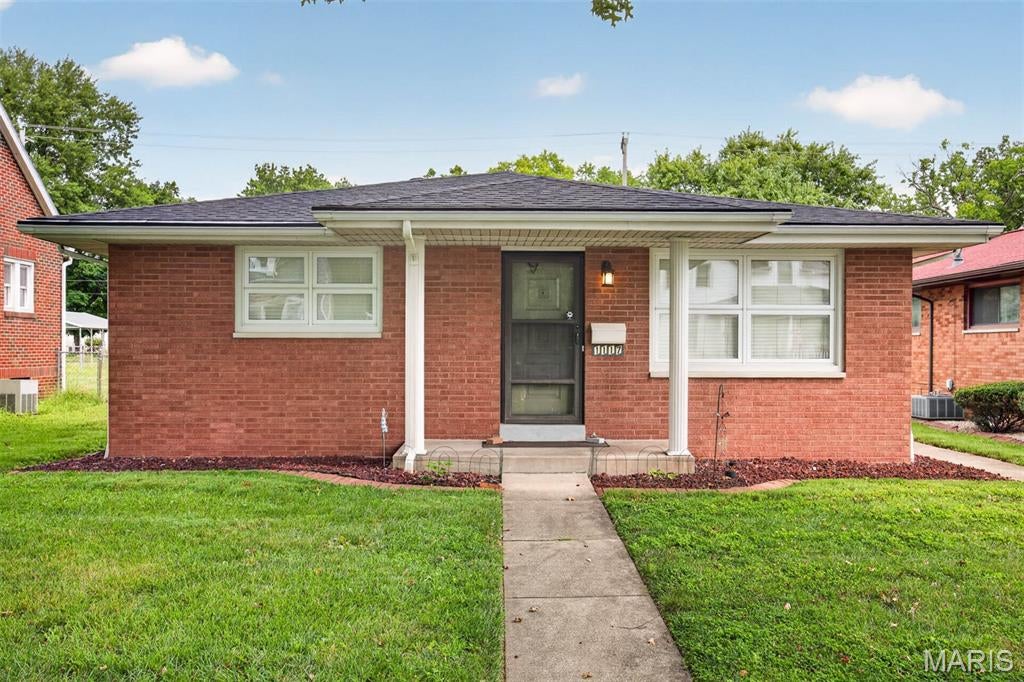 BEAUTIFUL ALL BRICK HOME! IMMACULATE UPDATED 2 BEDROOM HOME W/OVERSIZED HEATED 2 CAR ATTACHED GARAGE READY TO MOVE INTO. ENTERTAINING LIVING RM W/COIFFURED CEILING. EAT-IN KITCHEN HAS MANY WHITE CABINETS, BUILT-IN MICROWAVE & OVEN, ELECTRIC COOKTOP 2008, DISHWASHER & GARBAGE DISPOSAL. MASTER BEDROOM HAS HIS & HER CLOSETS. SPACIOUS FULL BATH W/LARGE COUNTERTOP, LINEN CLOSET. NEWER CARPETING, LVP FLOORING, STAIR TREADS & STAIR COVERS 4/2019. THERMAL WINDOWS. EXTRA INSULATION. RADIANT HEAT IN CEILING ON MAIN FLOOR.  RADIANT HEAT IN BASEMENT FLOOR.  NICE CLEAN BASEMENT THAT FEATURES A SHOWER, BASE CABINET W/DOUBLE SINK, ROUGH-IN FOR BATHROOM, SUMP PUMP AND B-DRY TRANSFERABLE WARRANTY 4/2016. OTHER UPDATES INCLUDE A/C 2018. ROOF & GUTTER GUARDS 6/2025. GARBAGE DISPOSAL 2018. GAS HEATER IN GARAGE 11/2014. SEWER CHECK VALVE 2006. COOKTOP 2008. BOILER 11/2002. HWH 10/2007. REMAINING FURNITURE & OTHER ITEMS STAY WITH PROPERTY. GREAT LOCATION IN THE CENTER OF TOWN.
