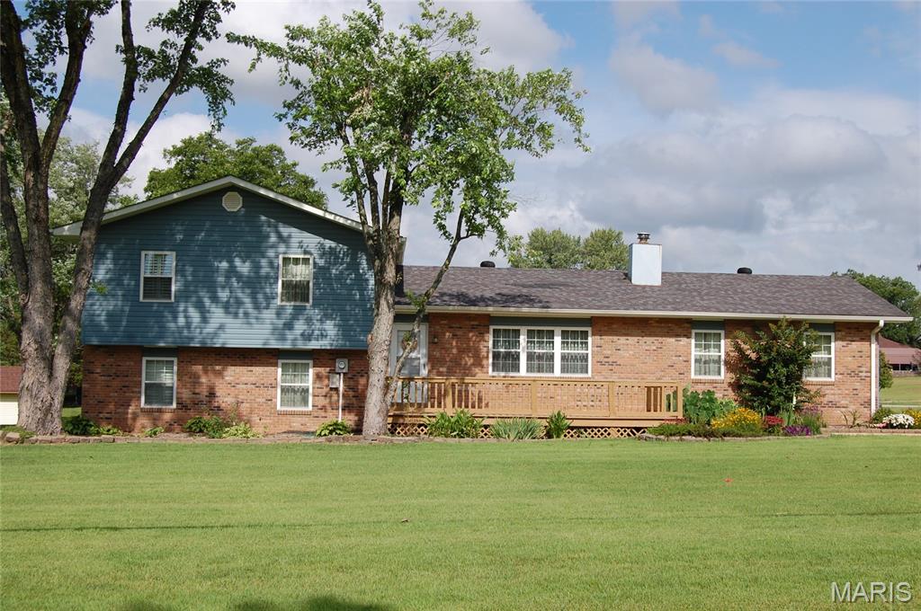 Super cute, neat as a pin, and move-in ready, all electric; 3 bedroom (2) 3/4 baths with showers, plus a half bath on a well-manicured, almost an acre corner lot. Wood-burning insert fireplace in the living room. Has a multi-use room, beautiful flower beds, walk out patio on the back and front deck. Also has 2 sheds in the back. Includes kitchen appliances, a washer and dryer, and a small freezer. Call today!