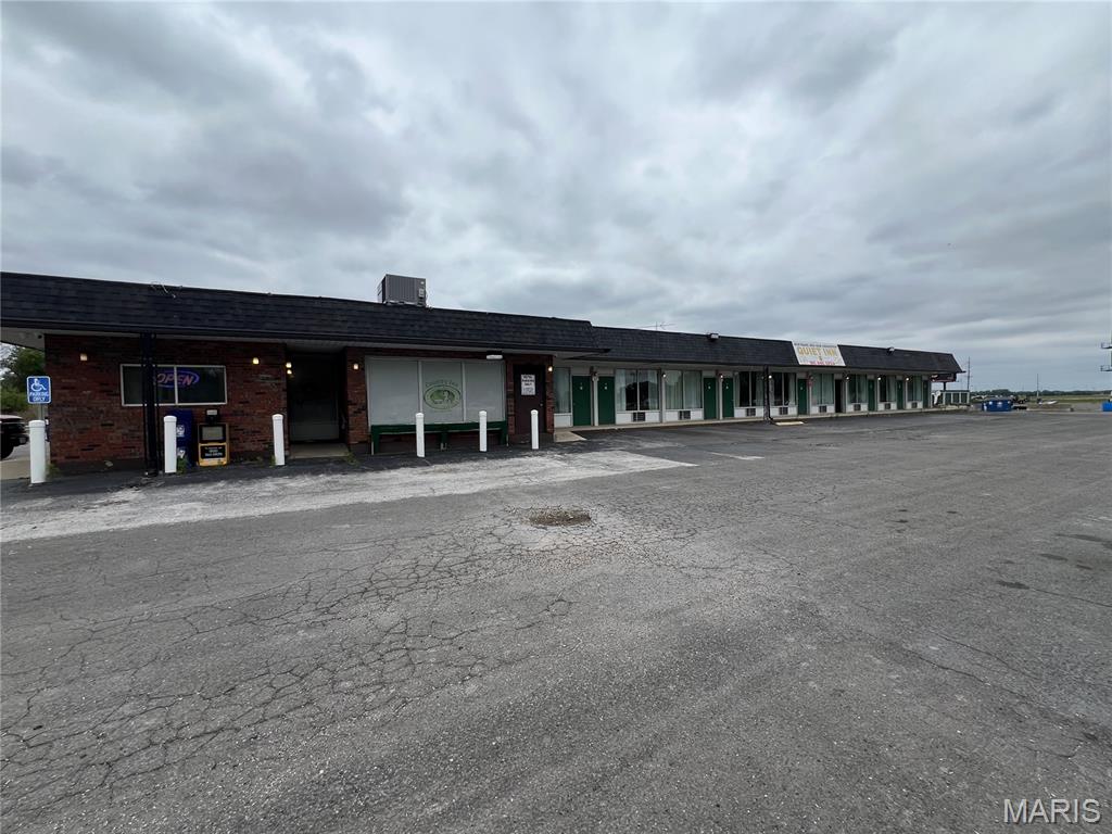 Located right off of Interstate 55, this restaurant and motel are the perfect location! Offering 19 rooms that are 23 x 11 each with the Motel, attached to the Restaurant, blending the two businesses together for the perfect marriage to provide service to customers day and night! The 1435 Sq Ft restaurant offers ample space for dining in as well as having enough space for kitchen needs. Easy access to plumbing and electrical through a service hallway between the motel rooms offers easy service without disrupting your patrons. Don't miss the great opportunity to own a business on Interstate 55! Call your favorite agent today to schedule a showing before it's too late!