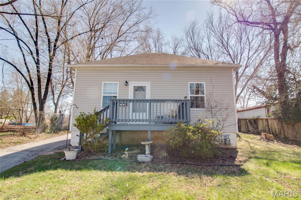Take a look at this well kept three bedroom gem in the heart of town! The living room is nicely open to the dining room and large kitchen with walk in pantry and a breakfast bar. You will love the main floor laundry area, large bathroom, and even larger primary bedroom with walk in closet. You will also find plenty of room for storage in the full basement, and a fully fenced back yard. Don't miss this one!
