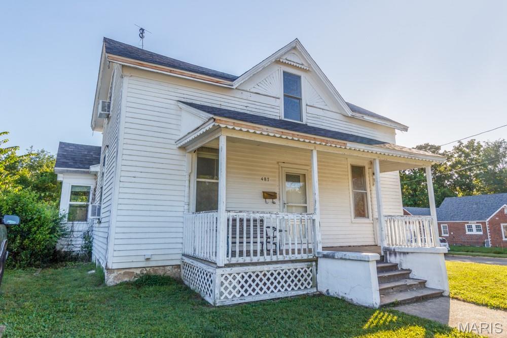Step into the charm of a bygone era with this beautiful 1900 Folk Victorian home, perfectly situated on a spacious corner lot. Showcasing timeless character with its welcoming covered front porch, decorative trim, and classic architecture, this home offers the perfect blend of historic appeal and everyday functionality. Inside, you’ll find spacious rooms filled with natural light and endless potential to make it your own. Outside, enjoy the convenience of a detached carport and a shop area that’s perfect for hobbies, storage, or a workshop. The generous yard provides plenty of space for entertaining, gardening, or relaxing outdoors. Whether you’re searching for a charming place to call home or an investment with character, this unique property offers classic craftsmanship, practical amenities, and an opportunity to own a piece of history. Schedule your private showing today!