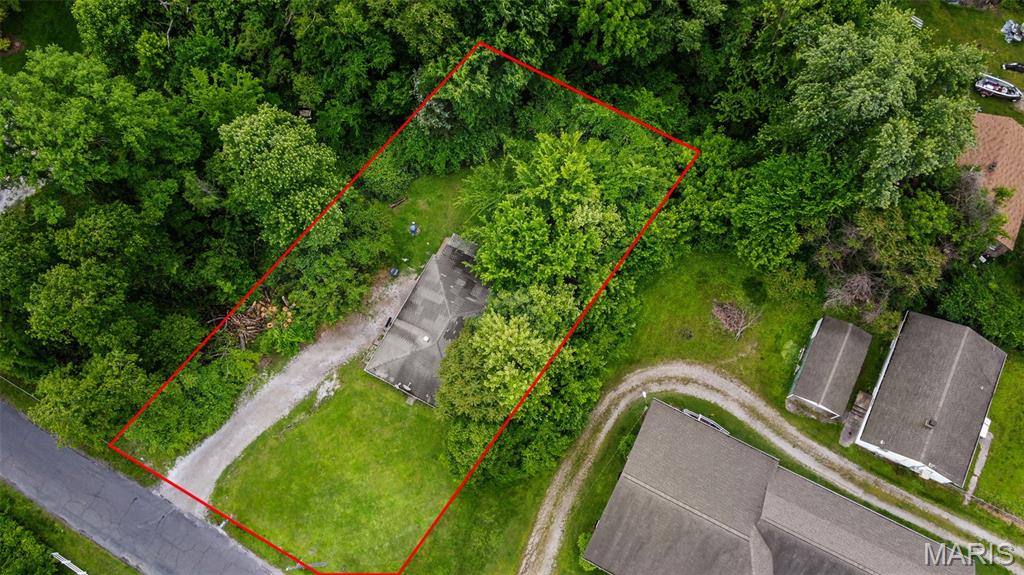 This is a listing that has character and plenty of land for gardening, farming, etc... There are 1.3 acres to do whatever your hearts desire is to do. The home is a bonus and is an AS IS property. The home is a great investment property and already has tenants in it.